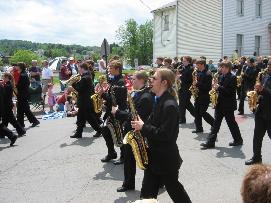 my son playing his tenor sax in the WV Strawberry Festival parade in 2009