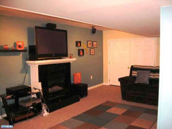 basement with gas fireplace