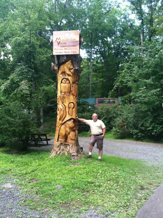 Bill next to the totem!