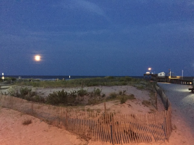 watching the super-moon rise over the ocean!