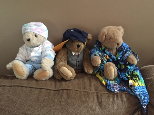Andrew's bears - one is wearing the outfit he was brought home from the hospital in, one is wearing his fav cap, the other is wearing a shirt Bill and I brought him from Jamaica